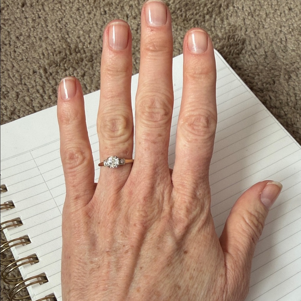 14k yellow gold ring with 3 round diamonds